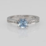 Aquamarine and diamond engagement ring